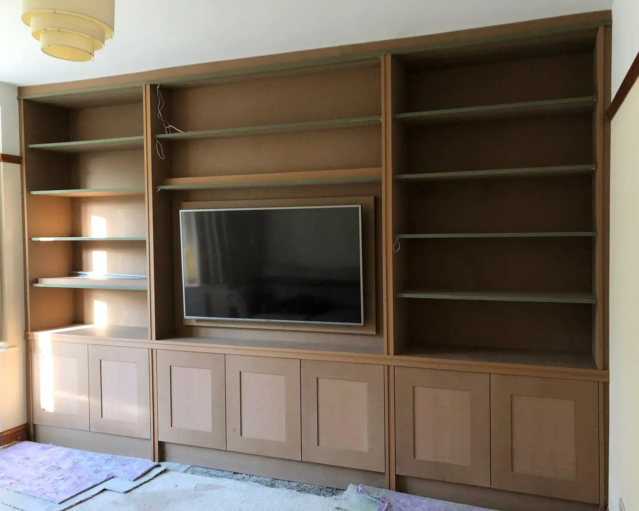 Tv mounted in newly fitted media centre
