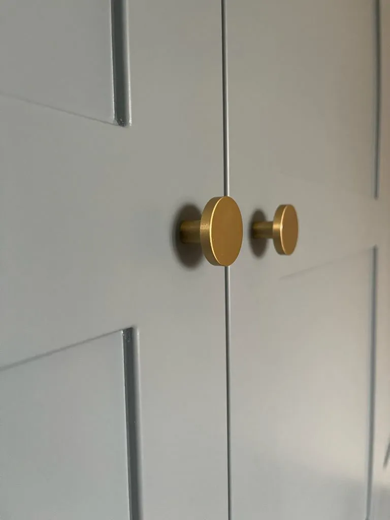 Close up of handles for hinged wardrobe