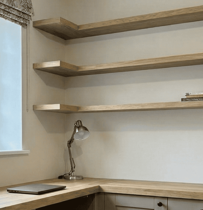 Under stairs storage in panelled wood effect pulled out for show